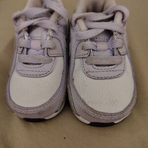 Nike White and Purple Sneakers with Classic Design